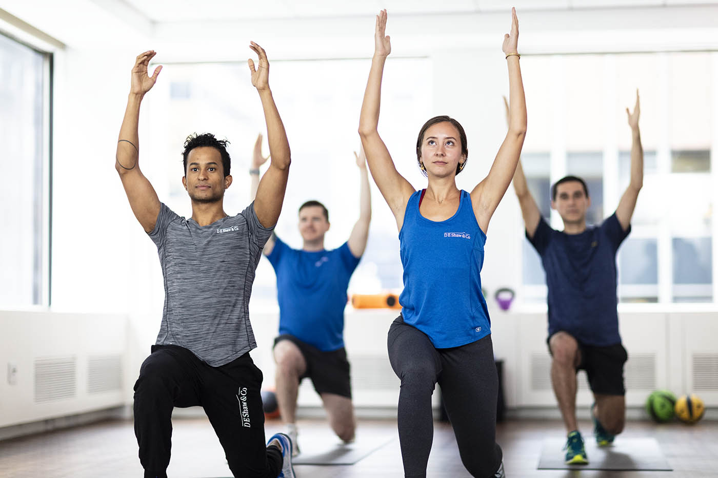 Employees doing yoga.